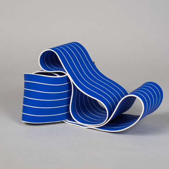 Entrapped 1: ribbon-like ceramic sculpture by Simcha Even-Chen made with paper porcelain painted in blue with white stripes.