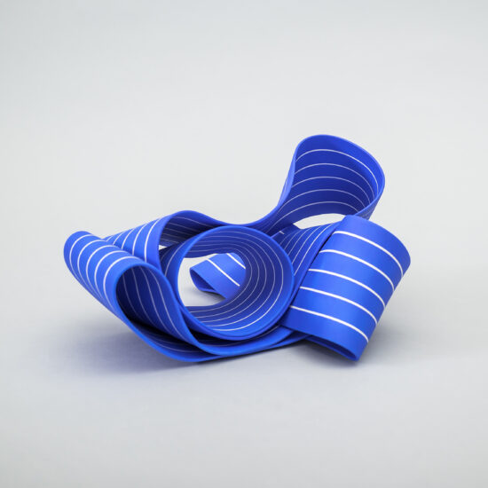 Entrapped 4: ribbon-like ceramic sculpture by Simcha Even-Chen made with paper porcelain painted in blue with white stripes.