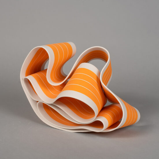 Folding in motion 5: ribbon-like ceramic sculpture by Simcha Even-Chen made with paper porcelain painted in orange with white stripes.
